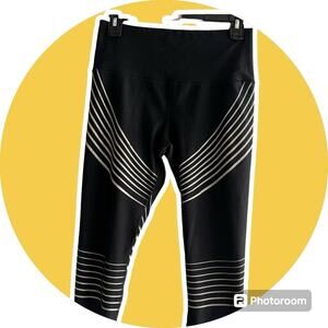 RBX leggings, capri, women's size S, Black with gold stripes.